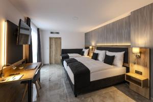 Ένα ή περισσότερα κρεβάτια σε δωμάτιο στο Hotel Tříška