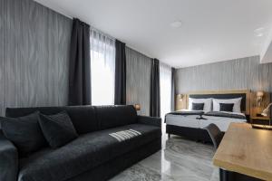 Ένα ή περισσότερα κρεβάτια σε δωμάτιο στο Hotel Tříška