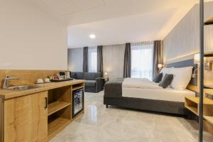 Ένα ή περισσότερα κρεβάτια σε δωμάτιο στο Hotel Tříška