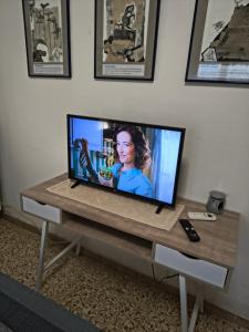 TV a/nebo společenská místnost v ubytování Domo de Logu SOS TRES RES