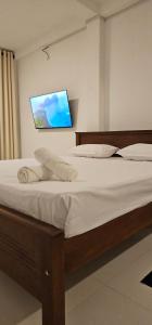 Letto o letti in una camera di VThree Family House