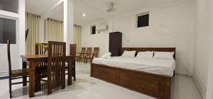 Letto o letti in una camera di VThree Family House