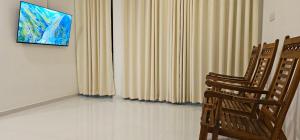 TV o dispositivi per l'intrattenimento presso VThree Family House