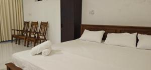 Letto o letti in una camera di VThree Family House