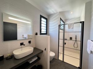 Vannituba majutusasutuses Appart hôtel PALM Suites CAYENNE