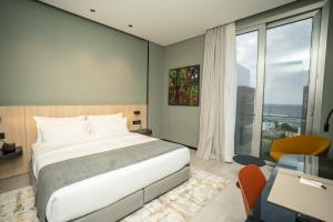 Sama Hotels客房内的一张或多张床位