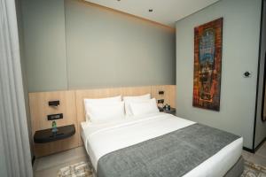 Sama Hotels客房内的一张或多张床位