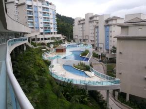 arial view of a swimming pool in a city at Apartamento Porto Real Brites in Mangaratiba