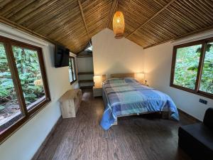 Postel nebo postele na pokoji v ubytování Cabaña Coffee Suite