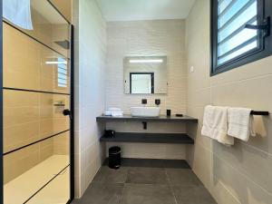 Vannituba majutusasutuses Appart hôtel PALM Suites CAYENNE