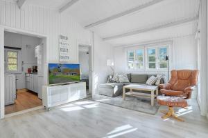 Posezení v ubytování Sommerhus i nærheden af strand og skov