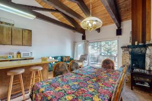 a kitchen and a dining room with a table and a kitchen at Dollar Hill 2 Dreamcatcher in Dollar Point