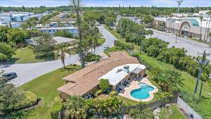 an aerial view of a house with a swimming pool at Paradise Palace in Sarasota