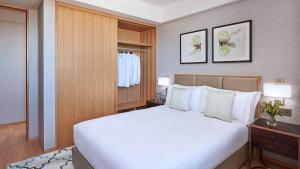Postel nebo postele na pokoji v ubytování hotel el amri akchour