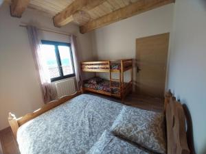 Gîte Au point de Vue 객실 침대