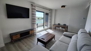Μια τηλεόραση ή/και κέντρο ψυχαγωγίας στο Apartamento cercano al Metro