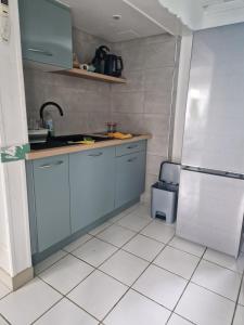 Kuchyň nebo kuchyňský kout v ubytování Cozy bungalow