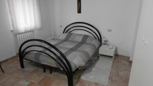 Postel nebo postele na pokoji v ubytování Alloggio Maria Gubbio Centro