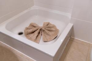 a white bath tub with a bow in the middle at RheinmeetsMosel Rheinufer Deutsches Eck in Koblenz +17 photos