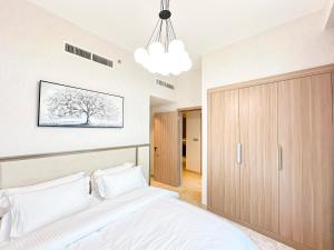 迪拜Stylish 3BR Apartment with Burj Khalifa & Pool Views的相册照片