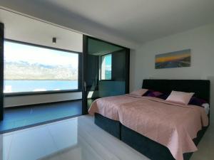 Ένα ή περισσότερα κρεβάτια σε δωμάτιο στο Villa One in Vinjerac