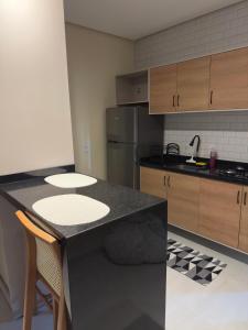 Η κουζίνα ή μικρή κουζίνα στο Flat em Alter do Chão