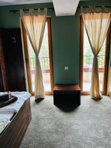 A bed or beds in a room at Villa Ema