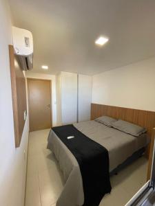 Postel nebo postele na pokoji v ubytování Apartamento Praia do Françes + 26 fotografií