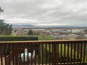 a balcony with a view of a city at Castlereagh Belfast beauty in Belfast