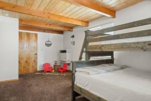 Ένα ή περισσότερα κρεβάτια σε δωμάτιο στο Wild Heart Cabin