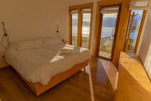 Ένα ή περισσότερα κρεβάτια σε δωμάτιο στο Errante Ecolodge