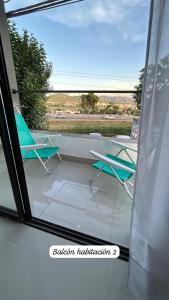 En balkon eller terrasse på LA Margarita