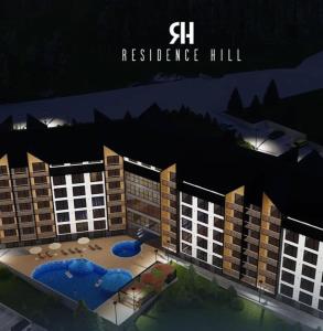 a rendering of a resort building with a pool at Apartman B64 Residence Hill Kopaonik in Kopaonik