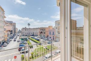 a balcony with a view of a city street at La Casetta di Lulù in Nettuno