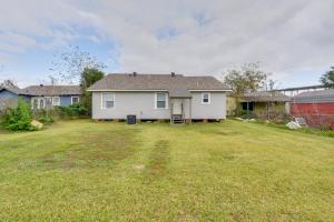 a white house in a yard with a large yard sidx sidx at Walking Distance to Casino Home in Westlake! in Westlake