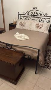 A bed or beds in a room at Affittacamere Mirella