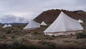 a group of tents in the middle of a field at Bryce Canyon Escalante Glamping in Cannonville
