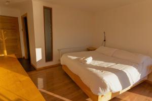 Ένα ή περισσότερα κρεβάτια σε δωμάτιο στο Errante Ecolodge