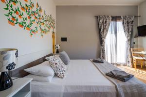Letto o letti in una camera di The Lemon Tree