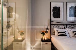 Posteľ alebo postele v izbe v ubytovaní Imagine Apartments