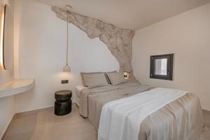 Postel nebo postele na pokoji v ubytování Noema Lindos - Agapitos Apartment