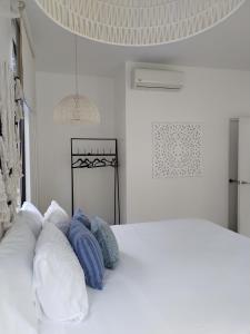 Postel nebo postele na pokoji v ubytování Hotel Luna Bella