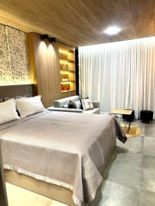 Postel nebo postele na pokoji v ubytování Studio Beira Mar NewTime 1210