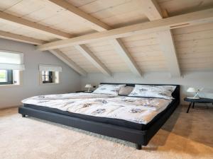 Uma cama ou camas num quarto em Villa in Abertamy near Klinovec Ski Resort