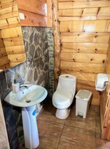 Koupelna v ubytování Hotel Orocay Lodge