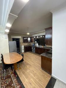 Kuchyň nebo kuchyňský kout v ubytování Toum's Apartments + 6 fotografií