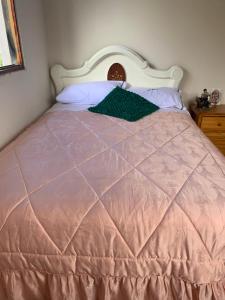 Postel nebo postele na pokoji v ubytování Hostal Rumyhuasy