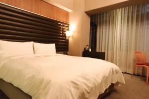 新麗旅店 Newful Hotel 객실 침대