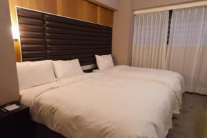 新麗旅店 Newful Hotel 객실 침대