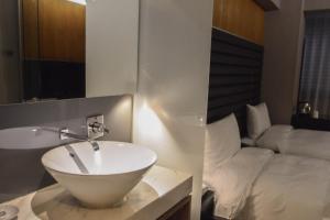 新麗旅店 Newful Hotel 객실 침대
